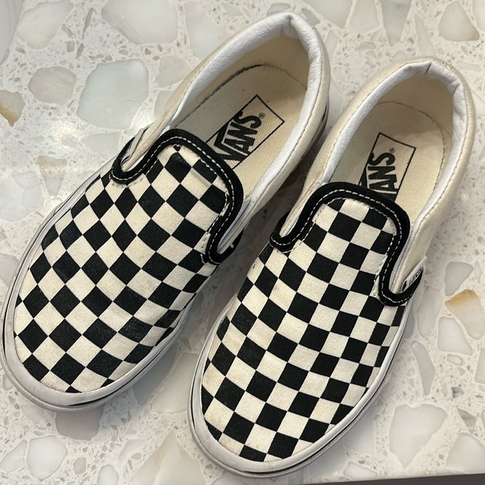 Kids Vans checkerboard slip-ons